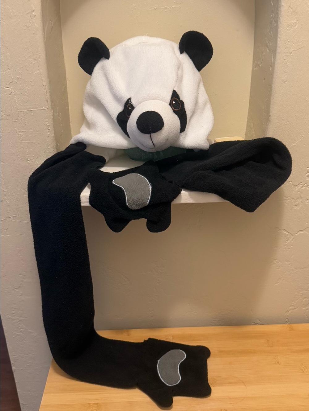 Fiesta panda plush hat with long arms and pockets